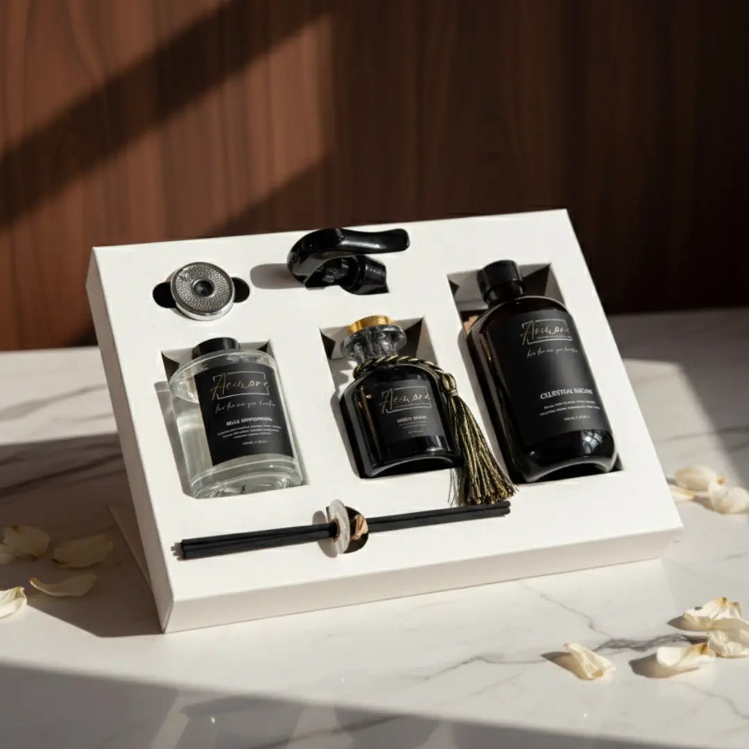 Set of black perfume bottles with decorative elements on a white tray against a wooden background.